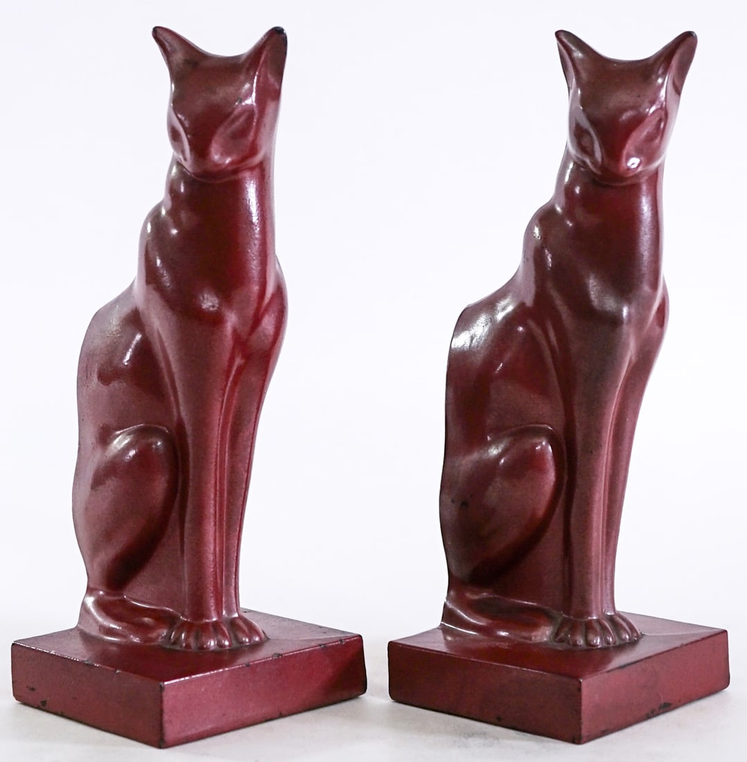 Art Deco Metalware (PR) Bookends Cats - RED: Art Deco pair bookends - geometric cats red. EACH measures 8 x 3.25 x 2.75 in. Paint wear to tips of ears. Marked A-S No. 20 on verso. Lot measures 8 x 3.25 x 5.5 inches for shipping purposes. The abs