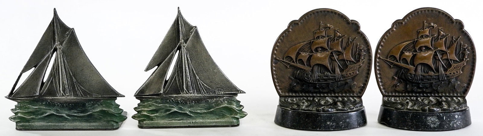 Nautical (2 Pair) Cast Metal Bookends: 1) Bradley and Hubbard sail ship - each measures 5.75 x 5.75 x 3.25 in. 2) Austria Bronze ship - each measures 5.75 x 5 x 1.75 in. Lot measures 5.75 x 5.75 x 850.5 inches for shipping purposes. The ab