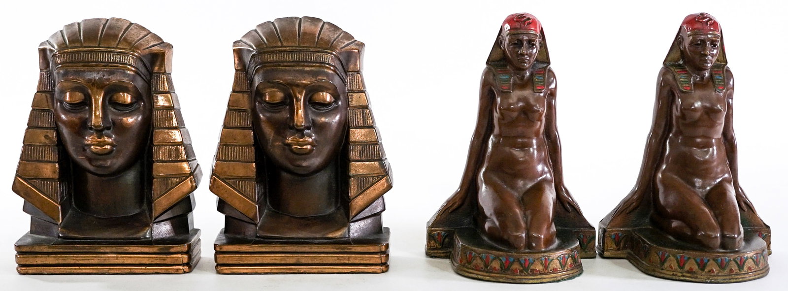 Egyptian (2 Pair) Vintage Bookends: 1) EGYPTIAN BUST SPHINX BOOKEND GILT SPELTER PHARAOH FACE HEAD DECO MALE. EACH measures 7 x 5.25 x 2.125 in. 2) Kneeling figure. K and O cast metal cold painted. EACH measures 7.25 x 5 x 4 in. Lot mea