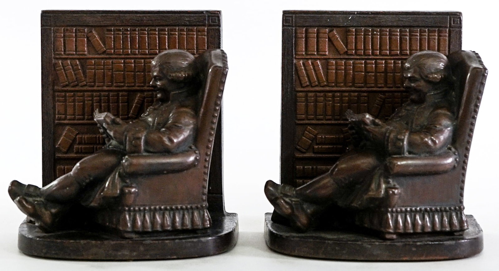 Judd 9961 'Father Knickerbocker' Pair Bookends: Pair of cast iron bookends. EACH measures 5.75 x 5.5 x 4 in. Lot measures 5.75 x 5.5 x 8 inches for shipping purposes. The absence of a condition report does not imply that the lot is in perfect condi