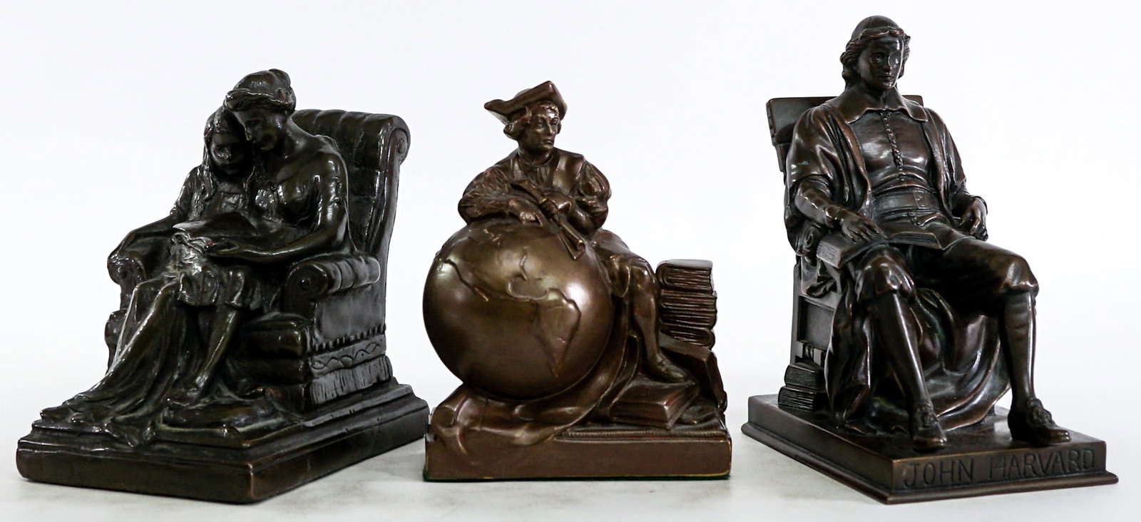 Antique Bronze Clad (3) SINGLE Bookends: 1) John Harvard SINGLE bookend, designed by Sculptor Daniel G. French and manufactured by The Jennings Brothers Manufacturing Company of Bridgeport, Connecticut. Measures 7.5 x 4 x 6.25 in. 2) Armor B