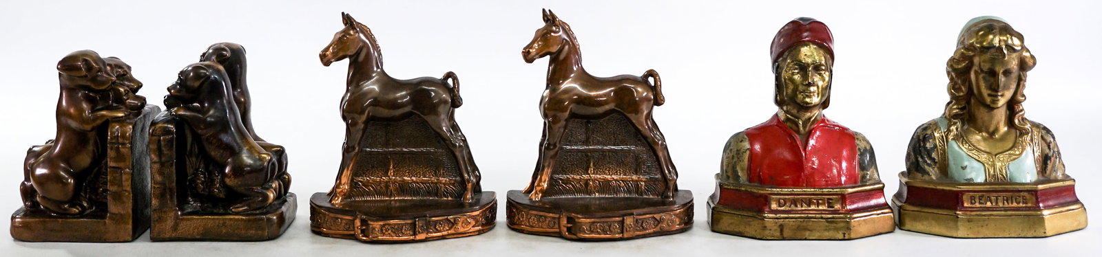 Bronze Clad (3 Pair) Vintage Bookends: Three (3) pair cast metal vintage bookends. Beatrice and Dante; Horse Colt; Puppies. Measure 6 to 7 in. tall. Lot measures 7 x 12 x 12 inches for shipping purposes. The absence of a condition report d