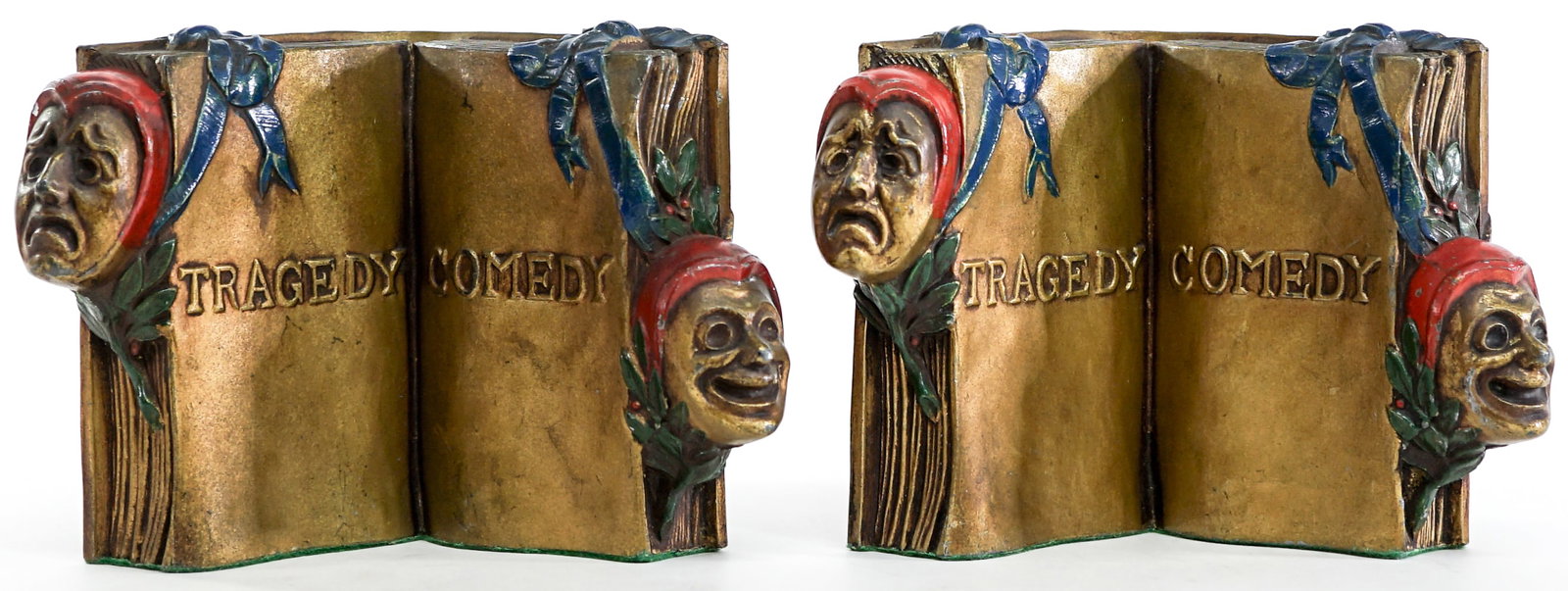 Tragedy / Comedy Theatre (Pair) Clad Bookends: Pair bookends measure 5.25 in. tall x 8 x 4.25 in. each. Lot measures 5.25 in. H x 7.75 in. W x 11 in. D for shipping purposes. The absence of a condition report does not imply that the lot is in perf