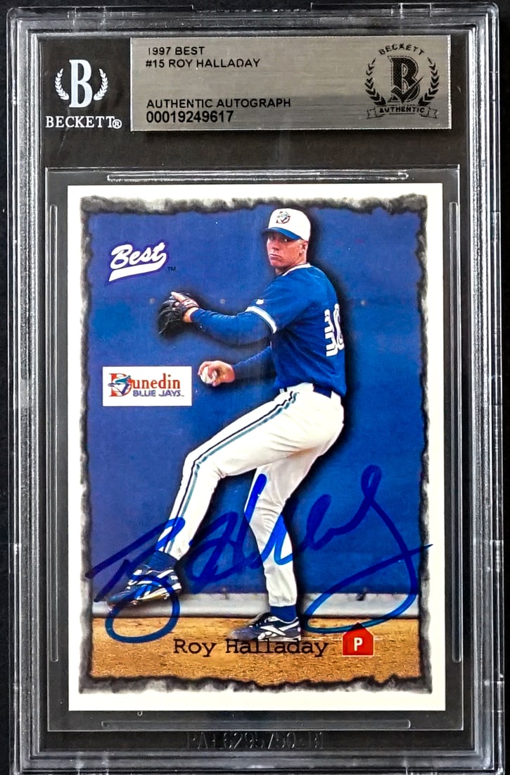 Roy Halladay On Card SIGNED 1997 Best #15: Lot measures 5.5 x 3.5 x .25 inches for shipping purposes. The absence of a condition report does not imply that the lot is in perfect condition or completely free from wear and tear, imperfections, o