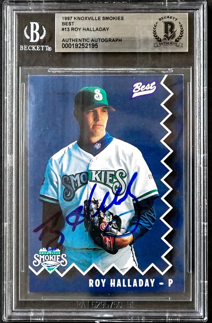 Roy Halladay On Card SIGNED 1997 Best #13: Lot measures 5.5 x 3.5 x .25 inches for shipping purposes. The absence of a condition report does not imply that the lot is in perfect condition or completely free from wear and tear, imperfections, o