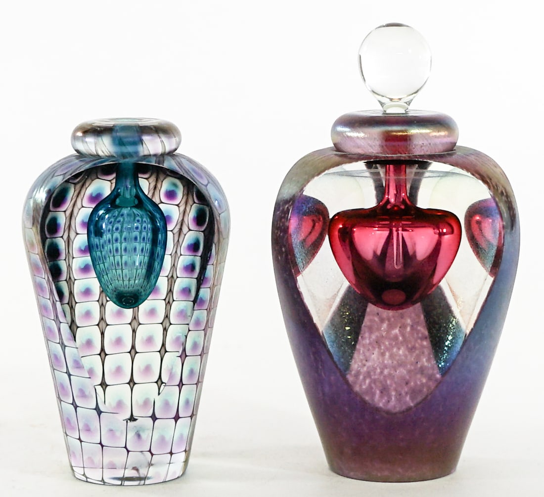 Tom Philbaum (2) Art Glass Perfume Bottles: Two (2) Tom Philbaum art glass perfume bottles. One (1) with stopper/dauber. Measure approximately 4.25 in. tall (measured without stopper). No evident cracks, chips or repairs. Lot measures 5.5 in. H