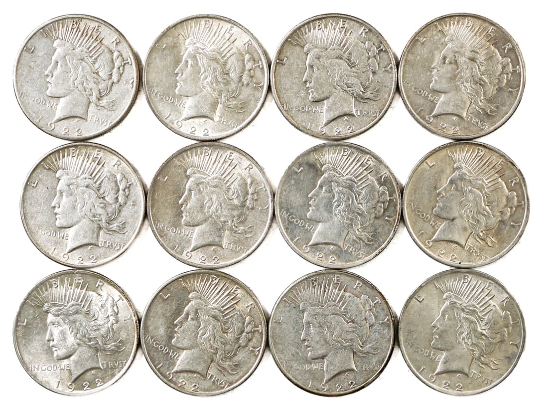 (12) U.S. Morgan Silver Dollars: Assorted dates, mixed condition. Our in-house shipping department will gladly pack and ship any item that fits into a 14x14x14 inch or 30x5x24 inch or equivalent or smaller box/folio if it is not frag