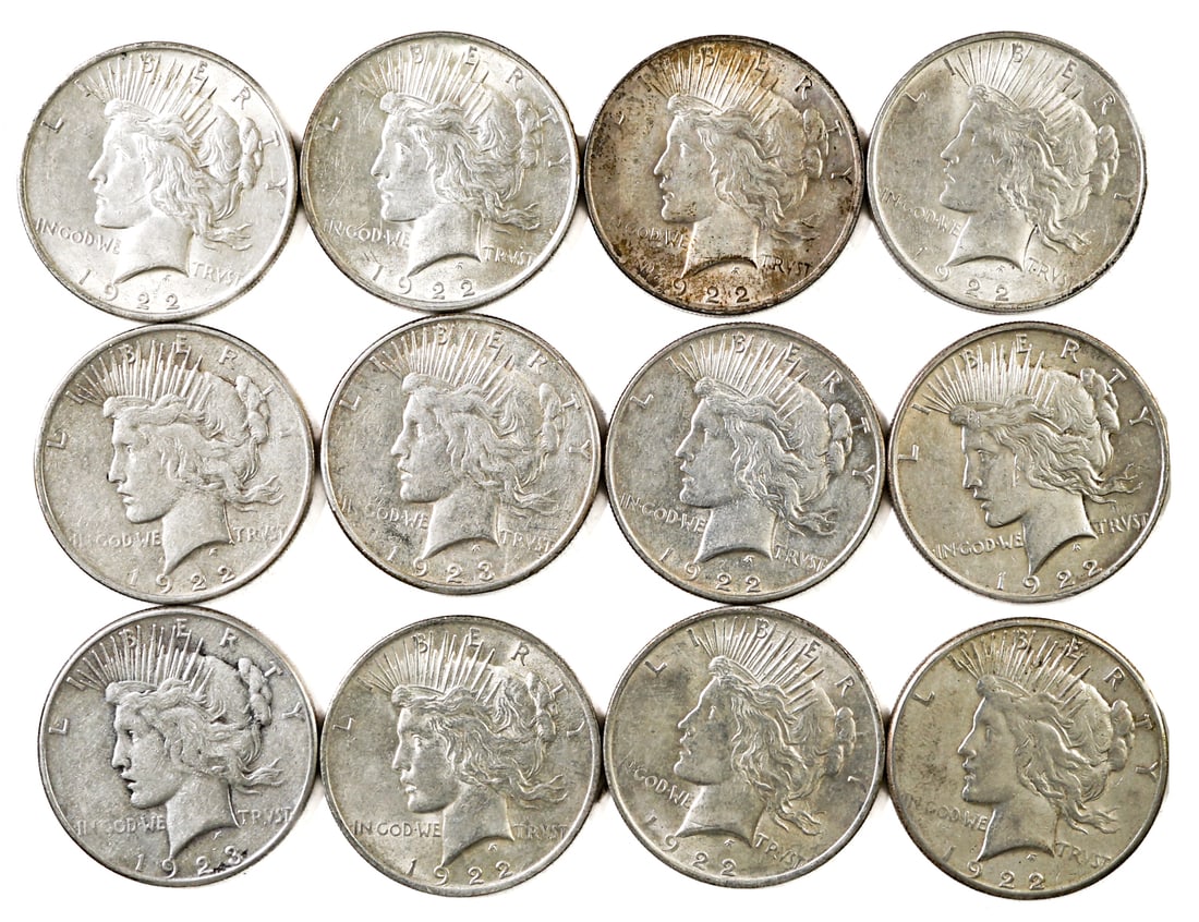 (12) U.S. Morgan Silver Dollars: Assorted dates, mixed condition. Our in-house shipping department will gladly pack and ship any item that fits into a 14x14x14 inch or 30x5x24 inch or equivalent or smaller box/folio if it is not frag