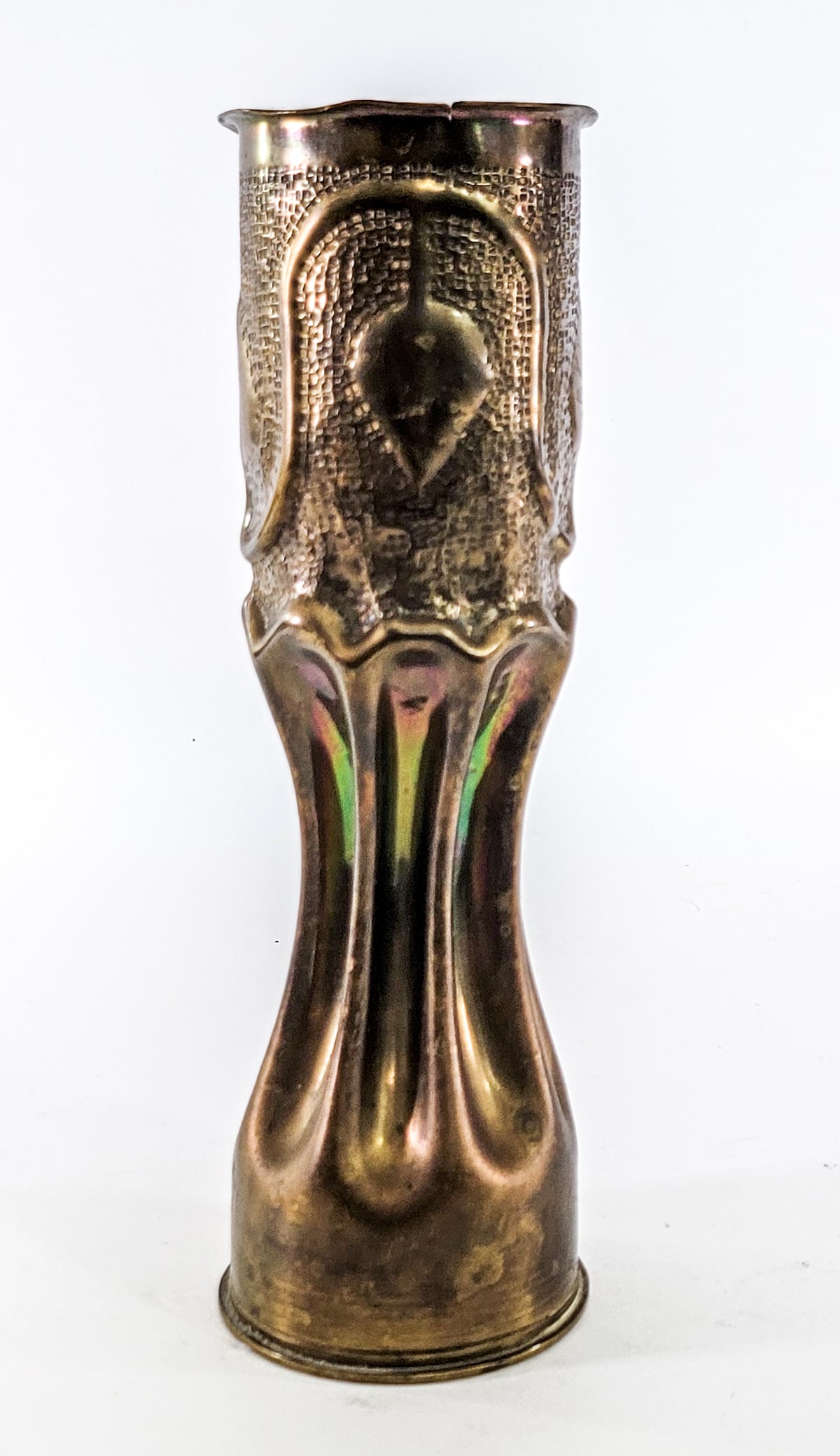 Trench Art 11IN Vase: Measures 11 x 3.5 x 3.5 in. Lot measures 11 in. H x 3.5 in. W x 3.5 in. D for shipping purposes only. The absence of a condition report does not imply that the lot is in perfect condition or