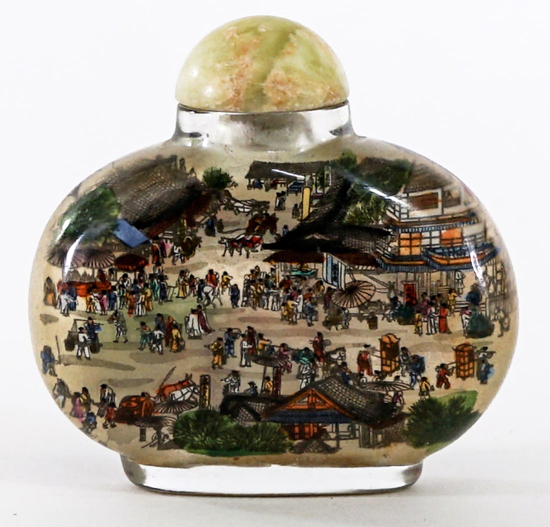 Chinese Inside Painted Snuff Bottle [Scenic]: Chinese inside painted snuff bottle with stopper. Measures 3 in. tall x 3 in. wide x 1.25 in. deep. No evident cracks, chips or repairs. The stopper neck appears worn. Lot measures 3 in. H x 3 in. W
