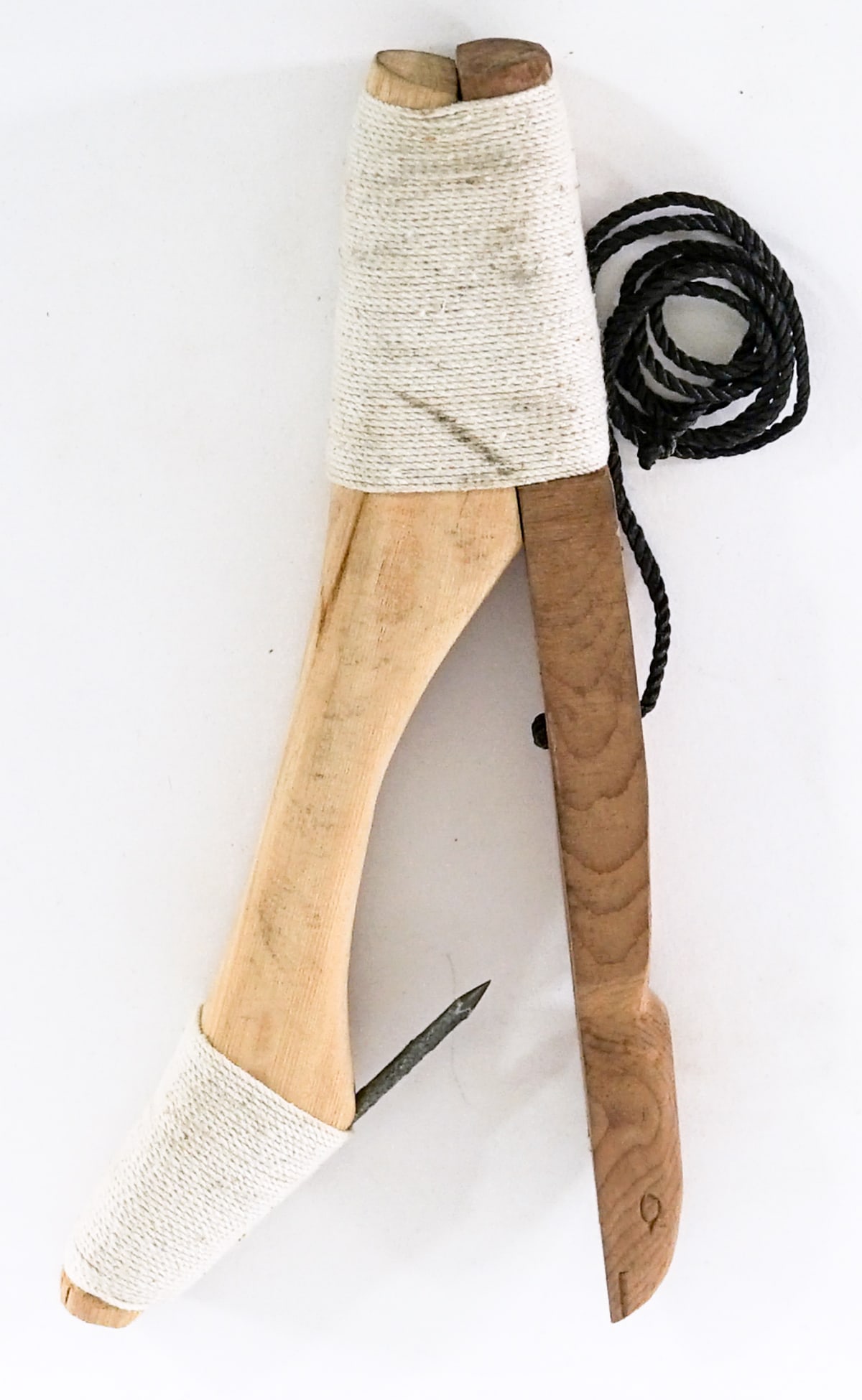 Carved Wood Halibut Hook: Carved wood Halibut Hook measures 9.5 in. x 4.5 in. x 1.5 in. No evident cracks, chips or repairs. Lot measures 9.5 in. H x 4.5 in. W x 1.5 in. D for shipping purposes only. The absence of a condition