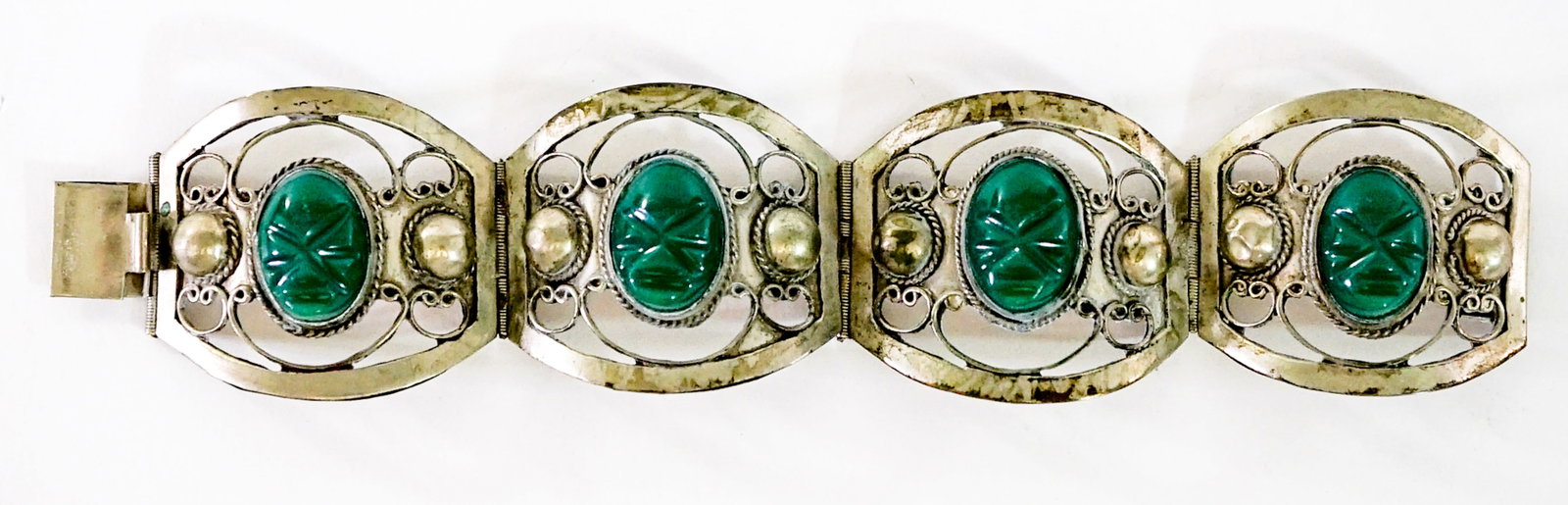 Turquoise 4 Stone Bracelet 7IN 46g: 7 in. bracelet sterling Taxco Mexico. Lot measures 2 in. H x 3.75 in. W x 3.75 in. D for shipping purposes only. The absence of a condition report does not imply that the lot is in perfect condition o
