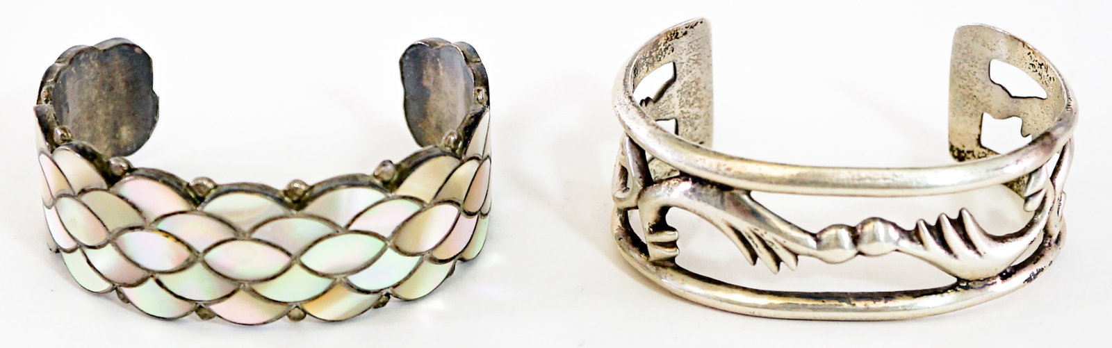 Southwest-Style (2) Cuff Bracelets 72g: Measure approximately 5.875 in. x 1 in. Lot measures 3.5 in. H x 3.5 in. W x 1.5 in. D for shipping purposes only. The absence of a condition report does not imply that the lot is in perfect condition