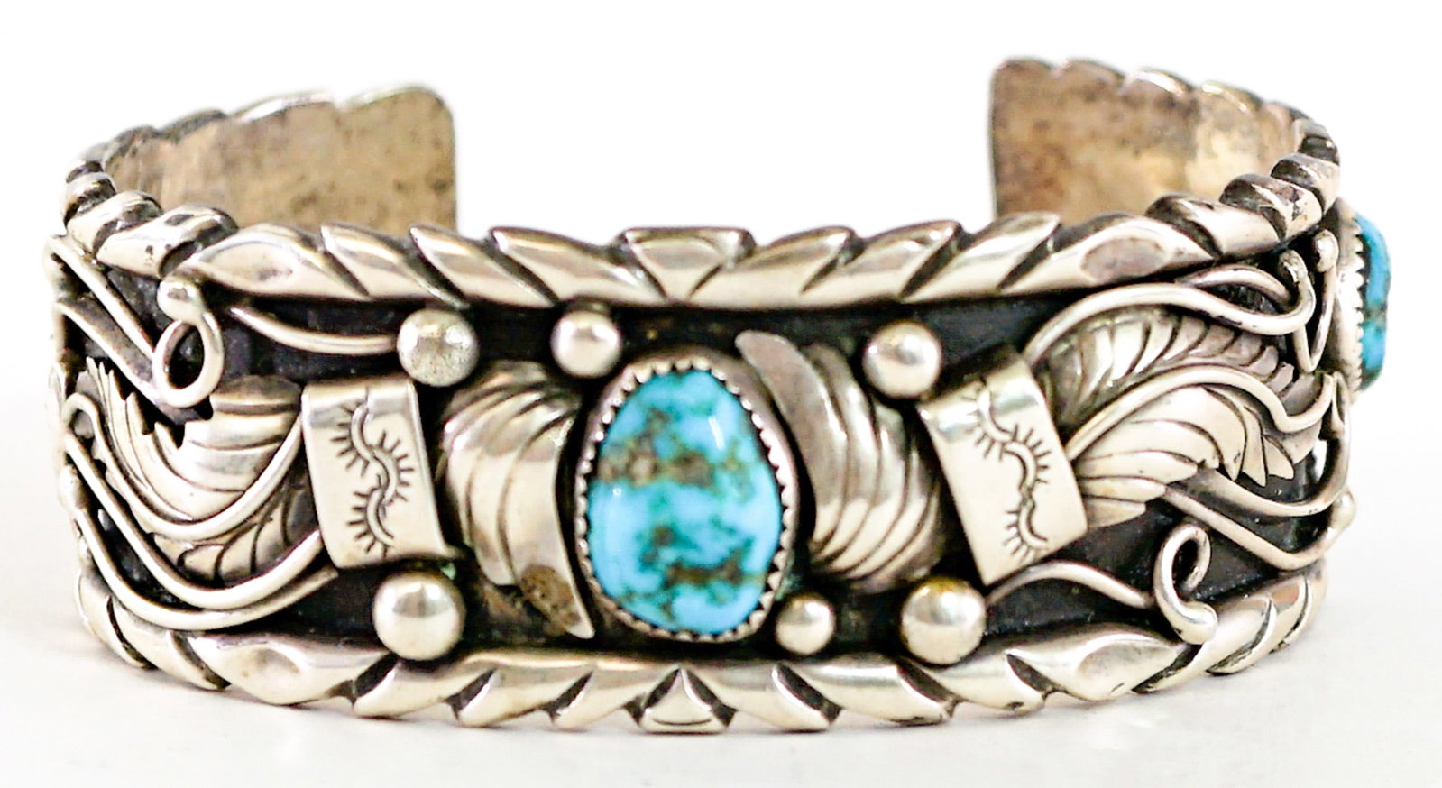 Turquoise Cuff Bracelet [2 Stones] 46g: Lacking one (1) stone. Measures 6.375 x 1 in. Inside circumference measures 5.75 in. total measures 7 in. Lot measures 3.5 in. H x 3.5 in. W x 1.5 in. D for shipping purposes only. The absence of a co