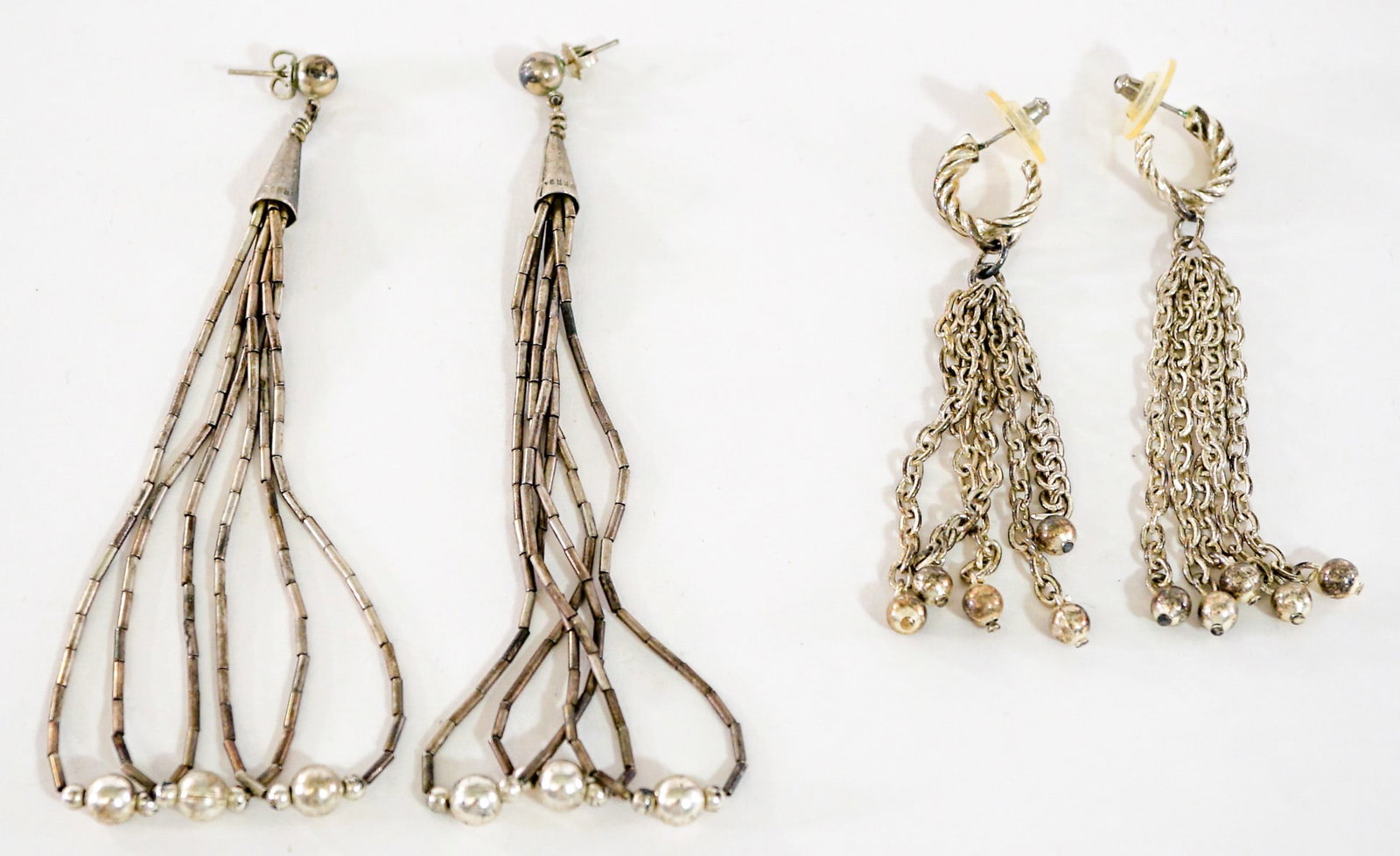 Southwest-Style (2PR) Pierced Earrings 28g: Two (2) pair earrings measure 3 to 4.25 in. Lot measures 3.5 in. H x 3.5 in. W x 1.5 in. D for shipping purposes only. The absence of a condition report does not imply that the lot is in perfect