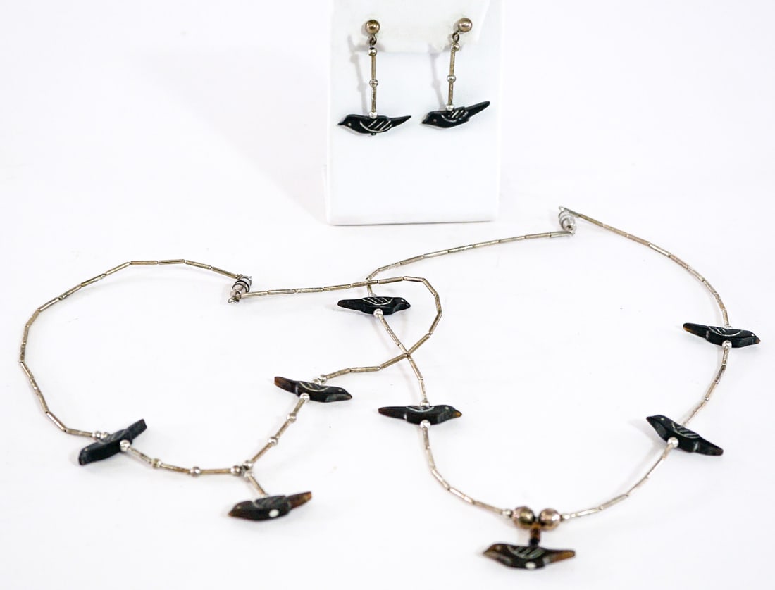 (2) Necklaces (1PR) Earrings [Birds] 16g: Necklaces measure 7 and 8 in. long. Earrings measure 1.5 in. long. Lot measures 3.5 in. H x 3.5 in. W x 1.5 in. D for shipping purposes only. The absence of a condition report does not imply that the