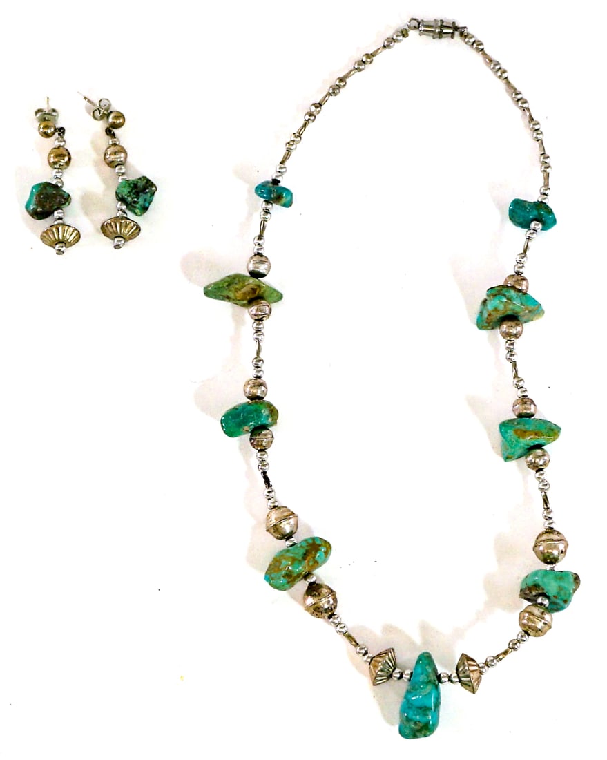 Turquoise / Silver Necklace and Earring Set 32g: Southwest-Style Necklace measures 8.5 in. long. Pierced earrings measure 1.5 in. each. Lot measures 3.75 in. H x 3.75 in. W x 1.5 in. D for shipping purposes only. The absence of a condition report
