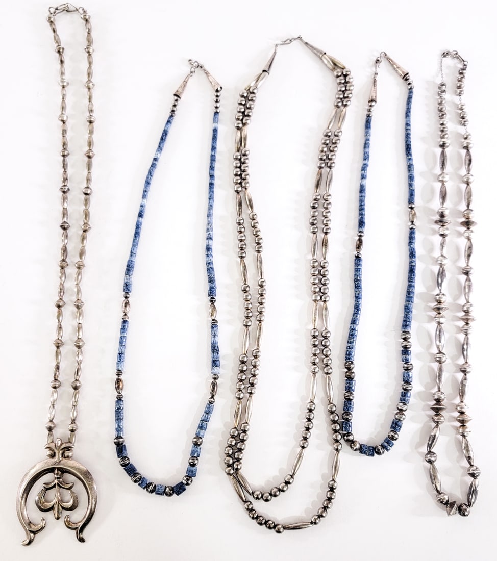 Beaded / Silver (5) Necklaces 236g: Southwest-style. Measure 12 to 15 in. long. Lot measures 15 in. H x 7 in. W x 1.5 in. D for shipping purposes only. The absence of a condition report does not imply that the lot is in perfect conditio