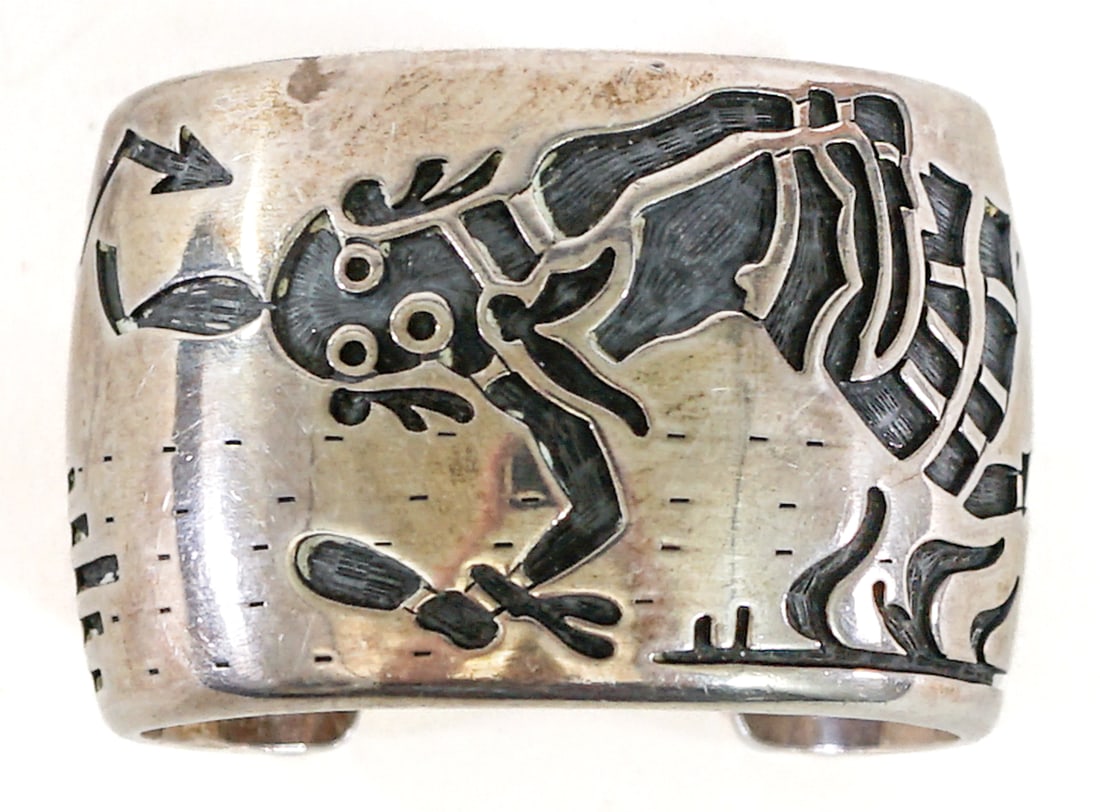 Hyson Craig Silver Kachina Cuff Bracelet 150g: Navajo artist Hyson Craig exceptional silver cuff bracelet depicting a 'Kachina Dancer'. Measures 6.625 in. x 1.75 in. wide. Inside circumference measures 5.375 in. total circumference measures 6.625 