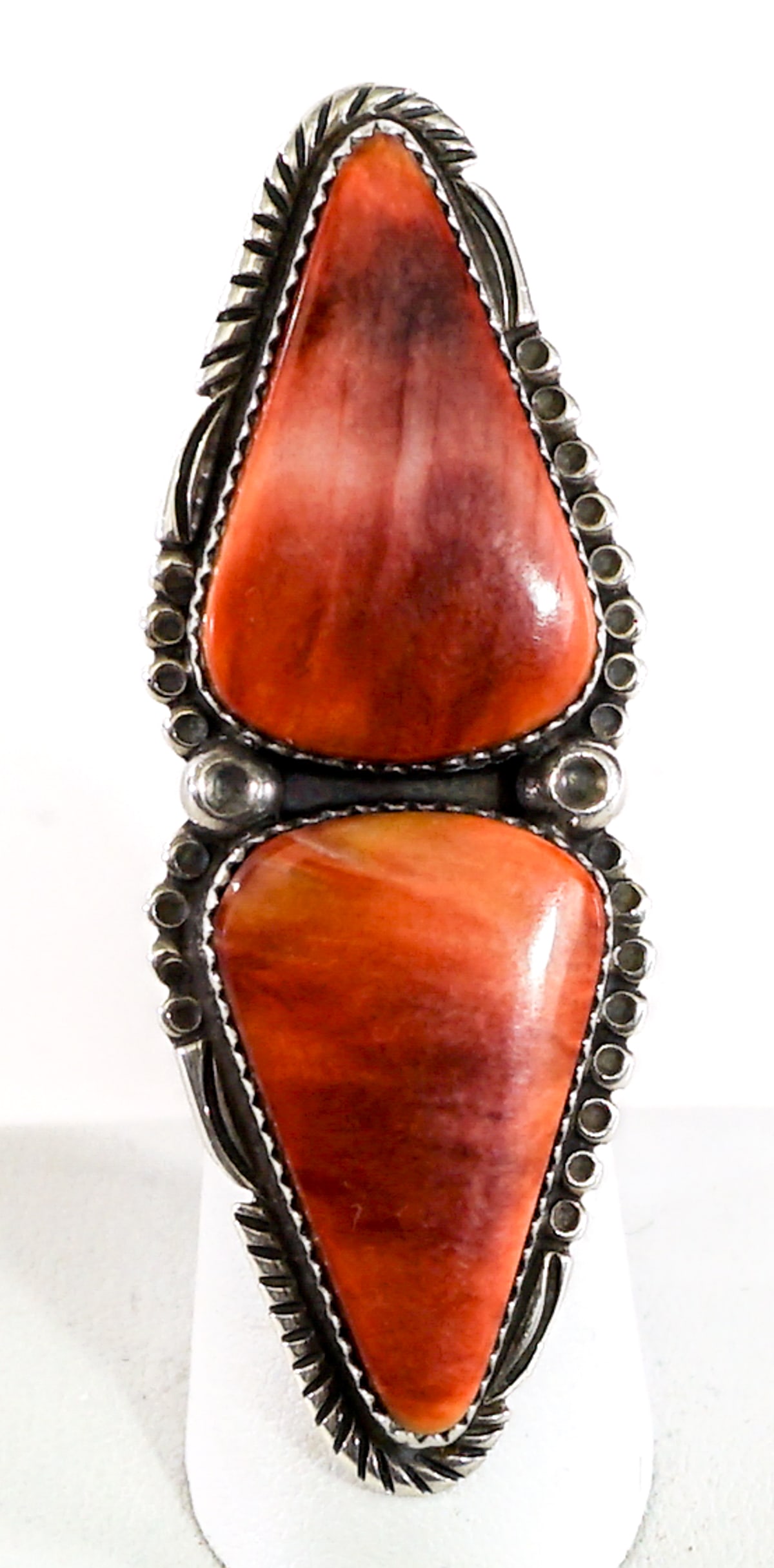 Garrison Boyd Navajo Size 6 Stone Sterling Ring: Garrison Boyd Size 6 sterling ring with 2 stones. Measures 2.75 x 1 in. Weighs 18 grams. Lot measures 3 in. H x 2.5 in. W x 1.5 in. D for shipping purposes only. The absence of a condition report does