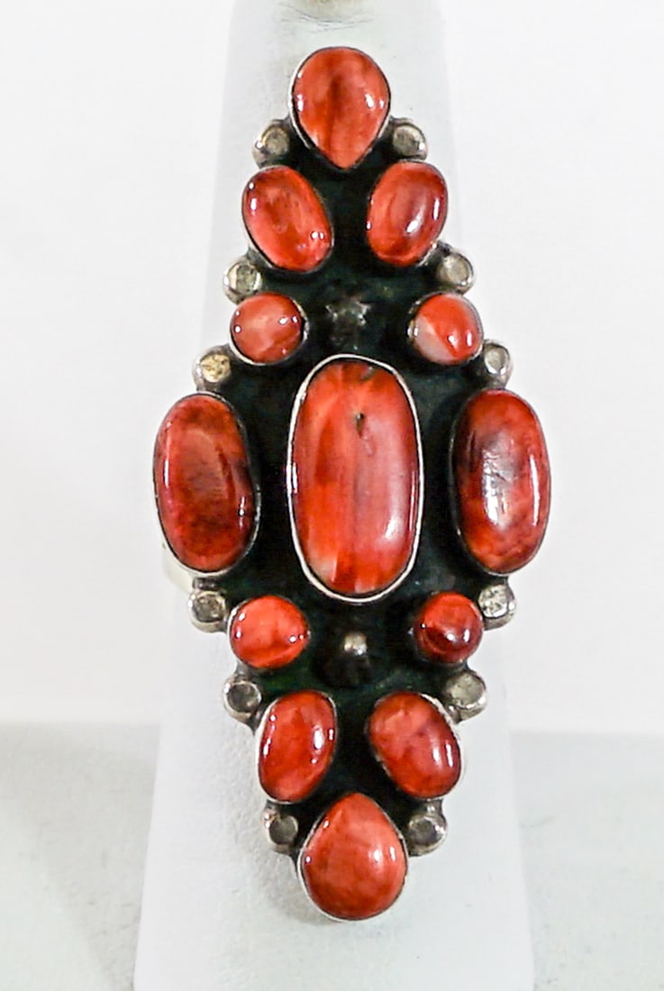 Lowell Draper Sterling Coral Size 7 Cluster Ring: Lowell Draper, Navajo sterling and coral size 7 ring measures 2 x 1 in. Weighs 10 grams. Lot measures 2 in. H x 2 in. W x 1.5 in. D for shipping purposes only. The absence of a condition report does n