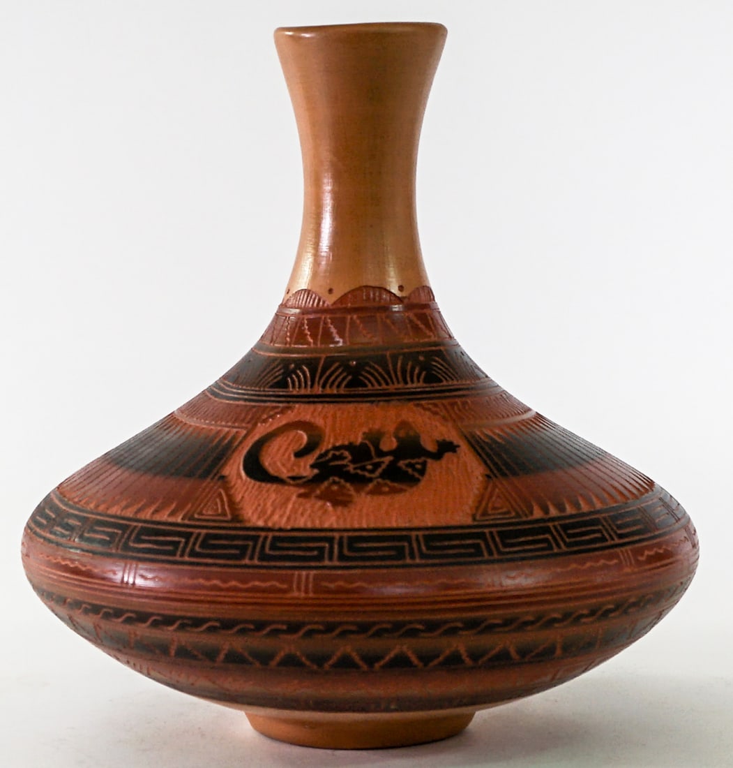 A. Joe SIGNED Navajo Etched 10IN Pottery Vase: A. Joe Navajo pottery vase. Lizard design. Measures 10 in. tall x 9 in. diameter. No evident cracks, chips or repairs. Lot measures 10 in. H x 9 in. W x 9 in. D for shipping purposes only. The