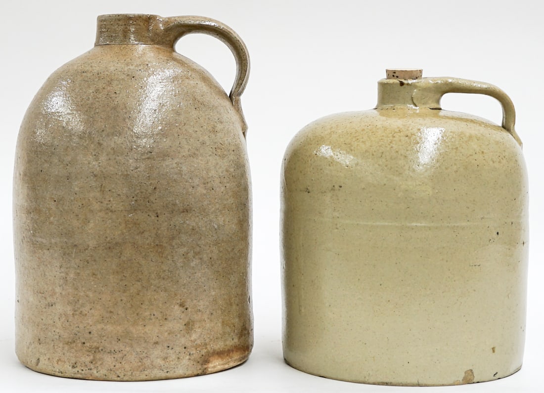 (2) Antique Jugs: They measure 8.5-10.5 inches tall. They measure 11 x 7 x 16.5 inches combined. The smallest has a chip at base. The absence of a condition report does not imply that the lot is in perfect condition