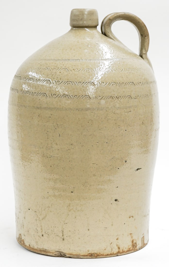 Large Salt Glaze Jug: Measures 15.5 x 9.5 x 9.5 inches. As-is condition with base chips. The absence of a condition report does not imply that the lot is in perfect condition or completely free from wear and tear, imperfec