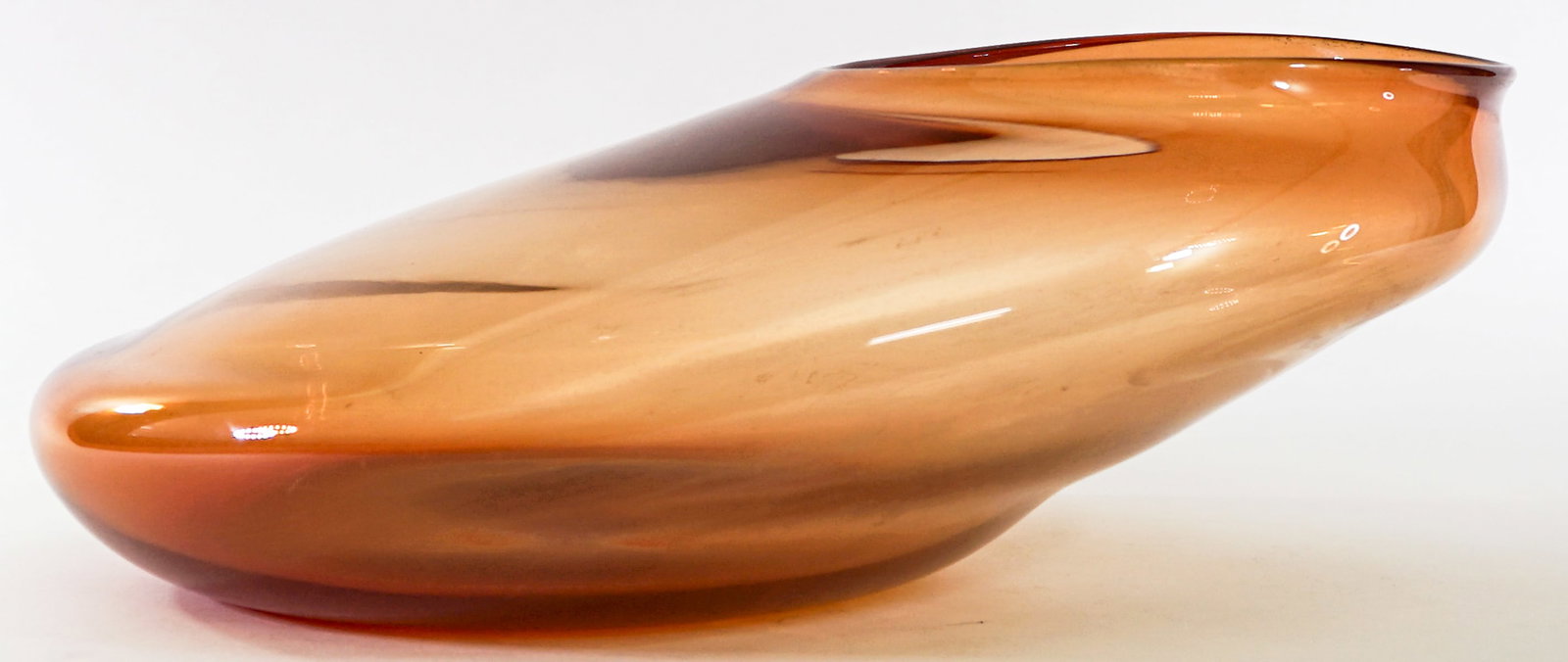 Joshua Haas Art Glass Handblown Glass [Amber]: Joshua Haas art glass bowl signed and dated 2008 underside. Measures approximately 6 in. tall x 17 x 15 in. Lot measures 6 in. H x 17 in. W x 15 in. D for shipping purposes only. The absence of a