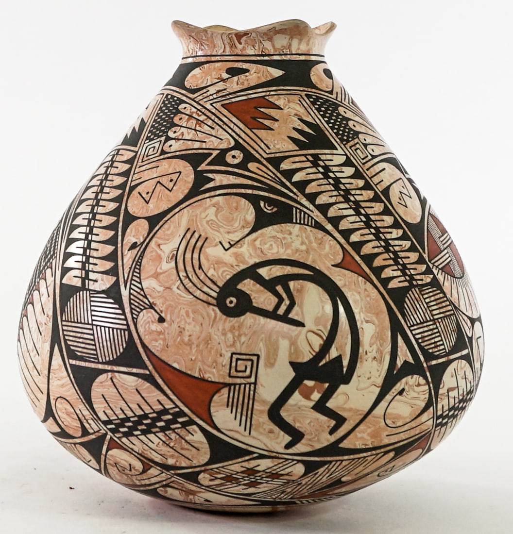 Artist SIGNED (Mata Ortiz) 7IN Pottery Olla: Artist signed underside. 7 inch polychrome pottery olla. Measures 7 in. tall x 7 in. diameter. No evident cracks, chips or repairs. Lot measures 7 in. H x 7 in. W x 7 in. D for shipping purposes