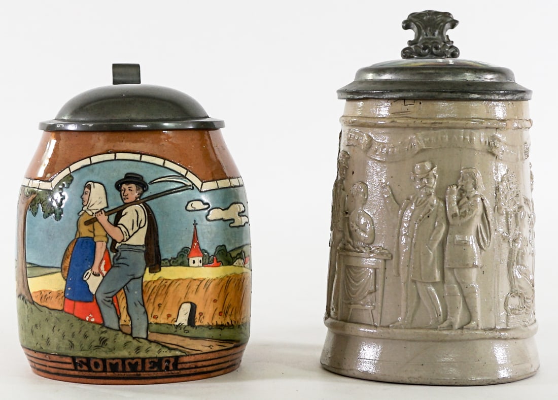 German (2) Steins: Two (2) German Steins measure 5.5 to 6.75 in. Lot measures 6.75 in. H x 5.75 in. W x 8 in. D for shipping purposes only. The absence of a condition report does not imply that the lot is in perfect