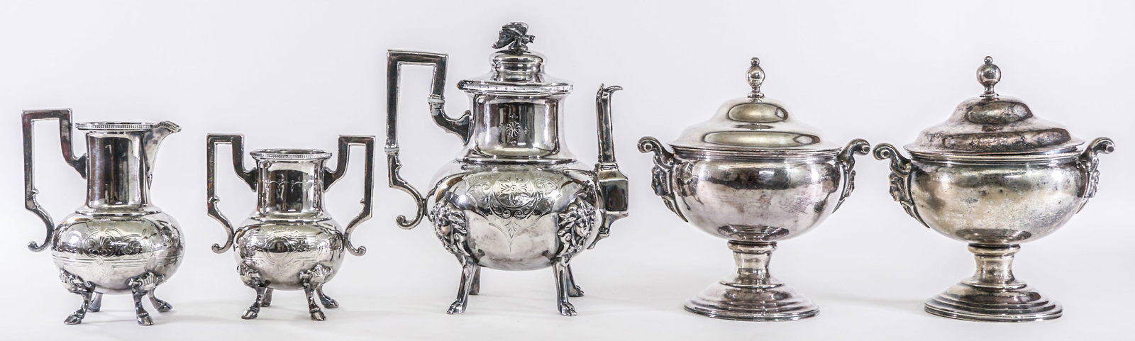 Silverplate (5 PC Set) Serveware: Includes Sugar, Creamer, Coffee / Tea Servier and (2) Covered Compotes. Lot measures 9 in. H x 15 in. W x 12 in. D for shipping purposes only. The absence of a condition report does not imply that