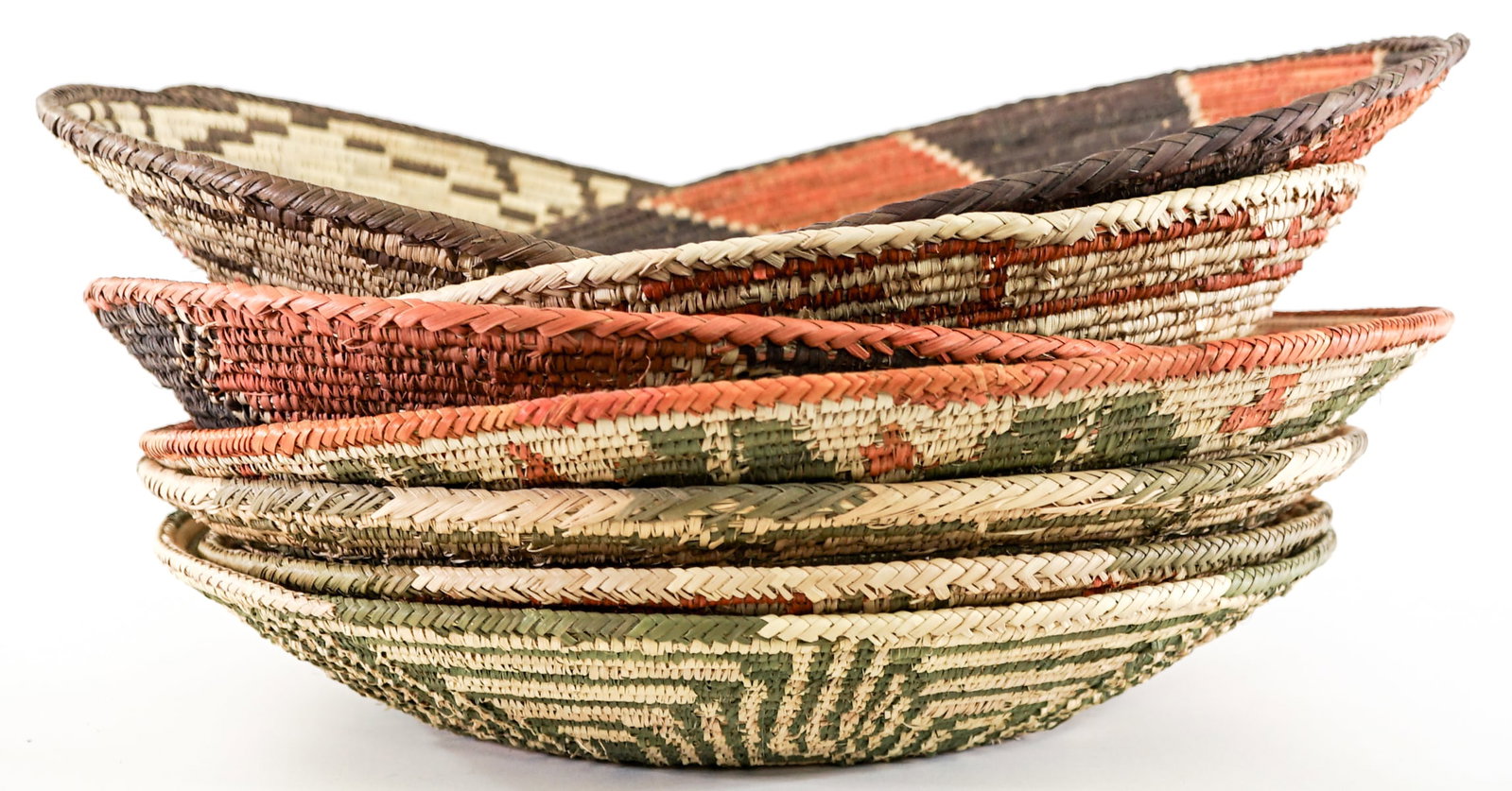 Woven (7) Baskets: Woven (7) basketry items. Lot measures 6 in. H x 15 in. W x 15 in. D for shipping purposes only. The absence of a condition report does not imply that the lot is in perfect condition or completely