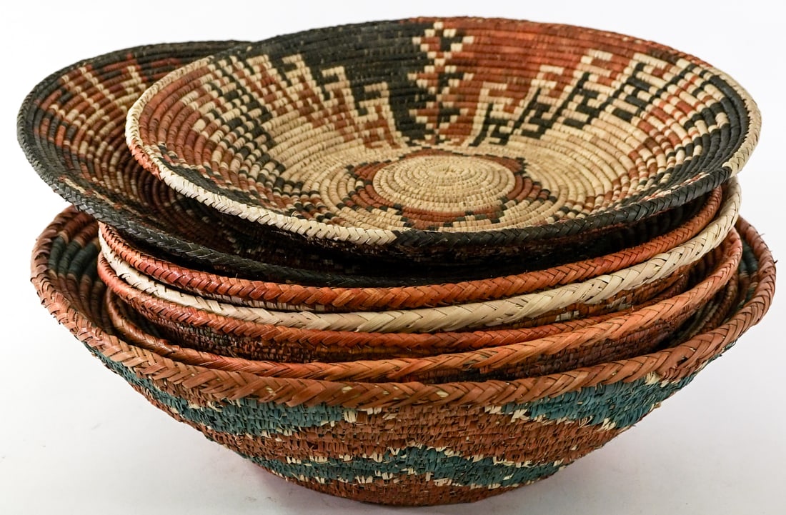 Group of Woven Baskets [8].: Group of Woven Baskets [8]. Lot measures 8 in. H x 18 in. W x 18 in. D for shipping purposes only. The absence of a condition report does not imply that the lot is in perfect condition or completely