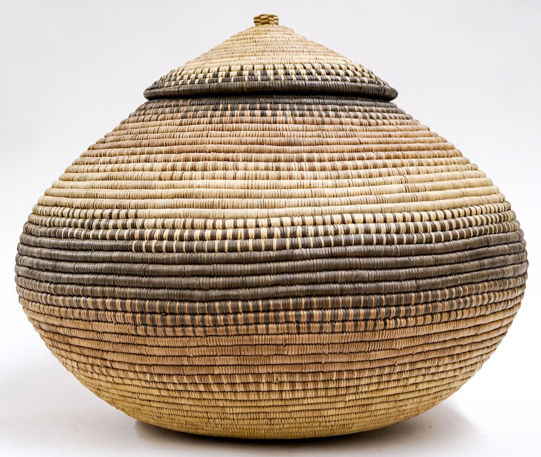 Large Lidded Basket: Measures 14 x 16 x 16 in. Lot measures 14 in. H x 16 in. W x 16 in. D for shipping purposes only. The absence of a condition report does not imply that the lot is in perfect condition or completely