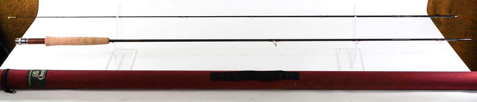 Orvis Trident PM-10+ 8.5' wt. 3/4 oz. 4 wt. line: Like-new condition. Lot measures 54 in. H x 2 in. W x 2 in. D for shipping purposes only. The absence of a condition report does not imply that the lot is in perfect condition or completely free from