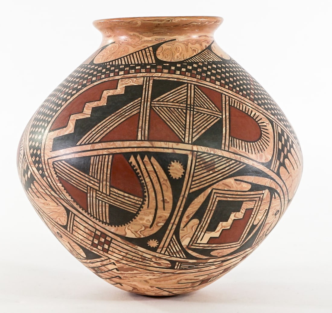 Salvador SIGNED Polychrome Small Pottery Vase: Measures 5.5 in. tall x 5.5 in. diameter. Rim measures 2.5 in. across. No evident cracks, chips or repairs. Lot measures 5.5 in. H x 5.5 in. W x 5.5 in. D for shipping purposes only. The absence of a