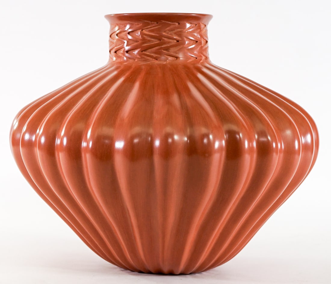 Hector Ortega SIGNED Pottery Melon Jar: Hector Ortega (Mata Ortez) redware melon pottery jar. Measures 9.5 in. tall x 10.5 in. diameter. Rim measures 4 in. across. No evident cracks, chips or repairs. Lot measures 9.5 in. H x 10.5 in. W x