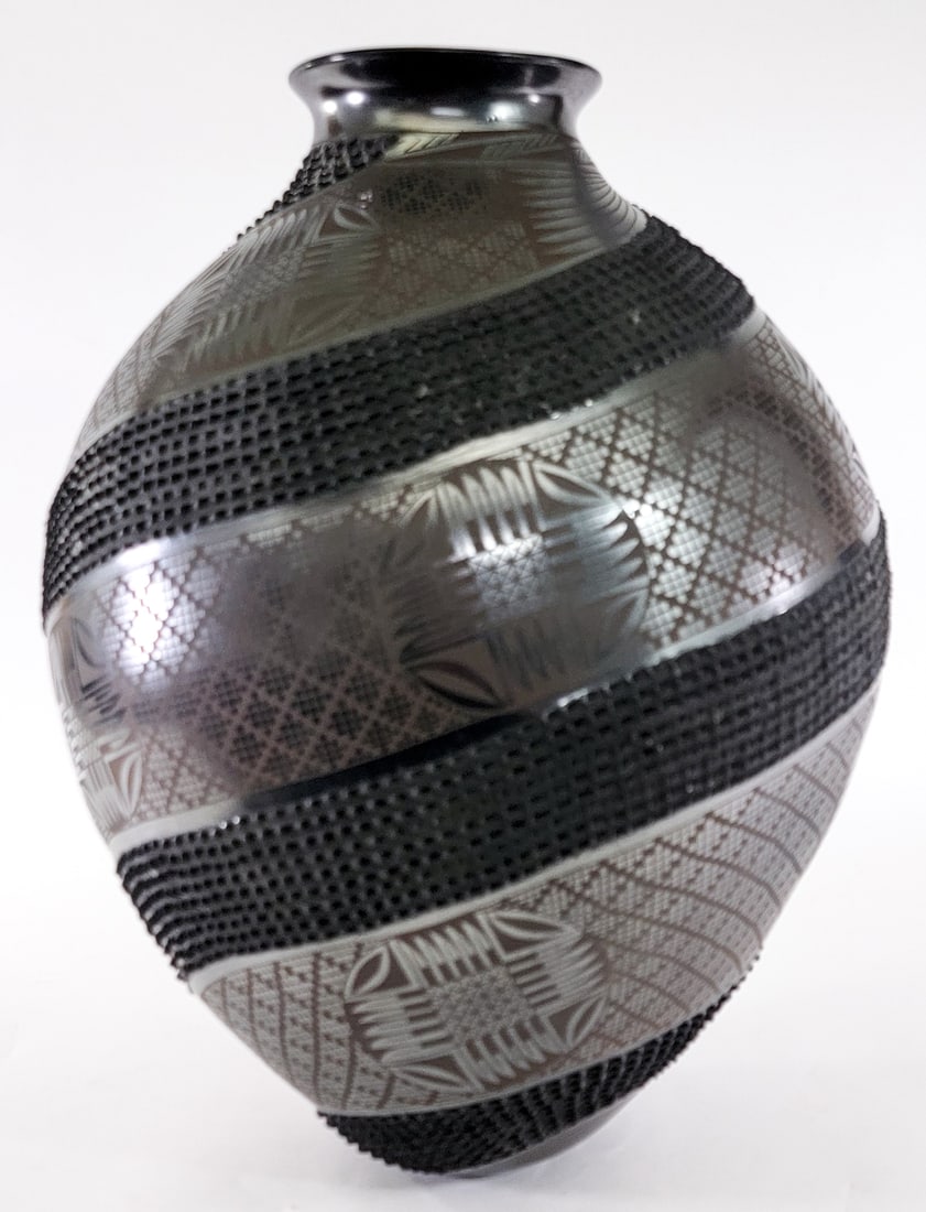 Cesar Sandoval SIGNED 17IN Vase Olla: Cesar Sandoval (Mata Ortiz) brownware vase signed underside. The corrugated sections appear to have dust in areas and the pot needs a good cleaning. Measures 17 in. tall x 12 in. diameter. No evident 