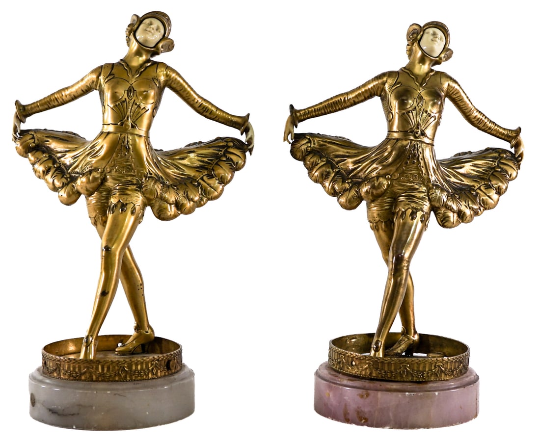 Art Deco Style Dancer (Pair) Bookends 9.5IN Tall: Pair of art deco style scarf dancer bookends. Cast metal clad figural with composite face and hands. Attached to a marble base. Each measures 9.5 H x 6.25 W x 4.5 in. D. Note the little finger one is 