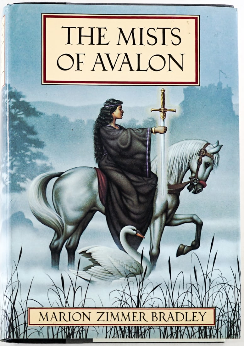 The Mists of Avalon-Marion Zimmer Bradley SIGNED: The Mists of Avalon by Marion Zimmer Bradley signed with inscription on half title page. Alfred A. Knopf 1982 1st with clipped dust jacket. Two-tone covers. Lot measures 9.5 in. H x 6.5 in. W x 2 in.