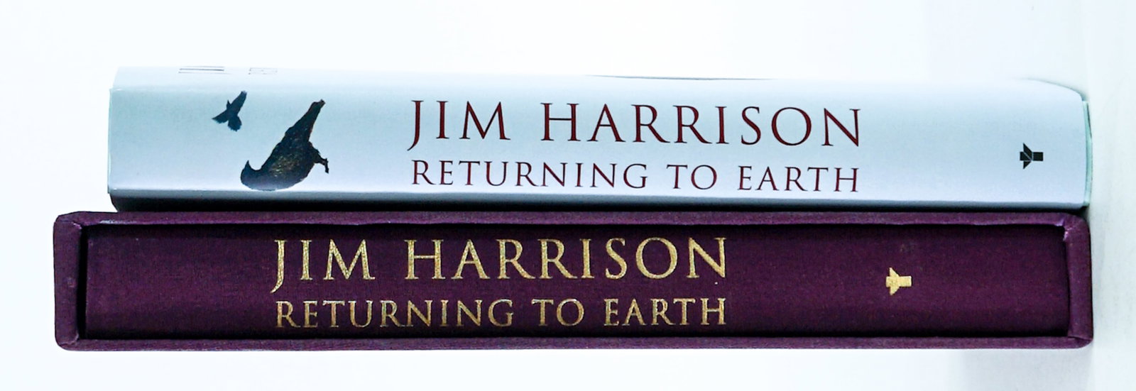 Jim Harrison (2) SIGNED Books Returning to Earth: Two (2) signed editions of Returning to Earth. 1) Slipcase version is signed and numbered 85 of 250 copies. Grove Press 2007 1st. 2) Grove Press 2007 is signed with unclipped dust jacket Lot measures 