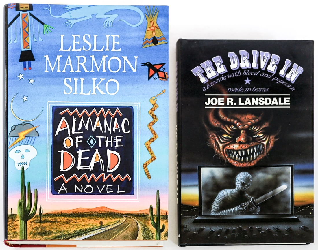 Author SIGNED (2) Books [Joe R. Lansdale]: 1) The Drive In by Joe R. Lansdale signed. Kinnell 1989 1st UK with unclipped dust jacket. 2) Almanac of the Dead by Leslie Marmon Silko signed with inscription. Simon and Schuster 1991 with unclipped