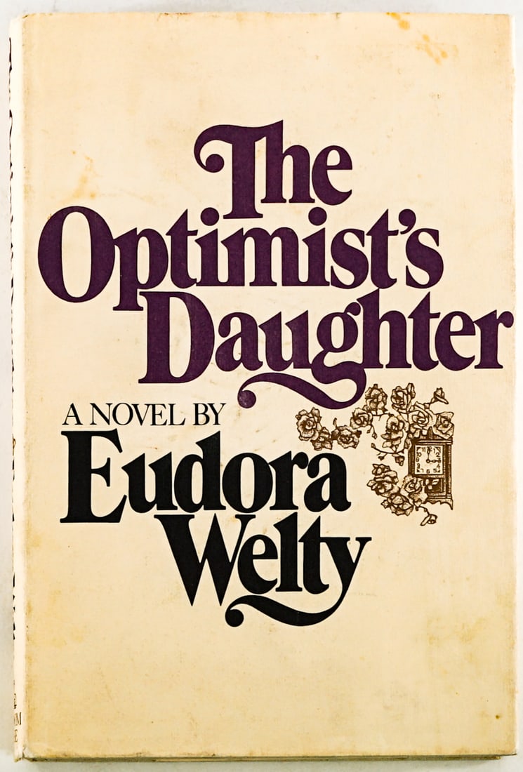 The Optimist's Daughter by Eudora Welty SIGNED: The Optimist's Daughter by Eudora Welty signed with inscription on half-title page. Random House 1972 1st with unclipped dust jacket. Cloth covers with some staining. Lot measures 8.5 in. H x 5.75 in.