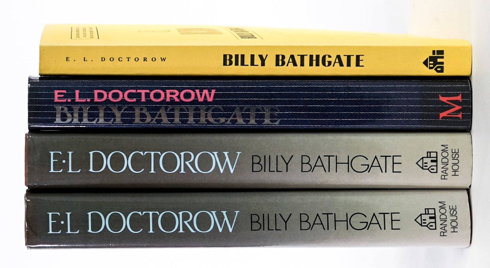 Billy Bathgate (4) 1ST Editions by E.L. Doctorow: Includes: Softcover review copy - Random House 1989; Macmillan, London 1989 HC with unclipped dust jacket; (2) Random House 1989 HC with unclipped dust jacket. Lot measures 9.5 in. H x 6.5 in. W x 5 i