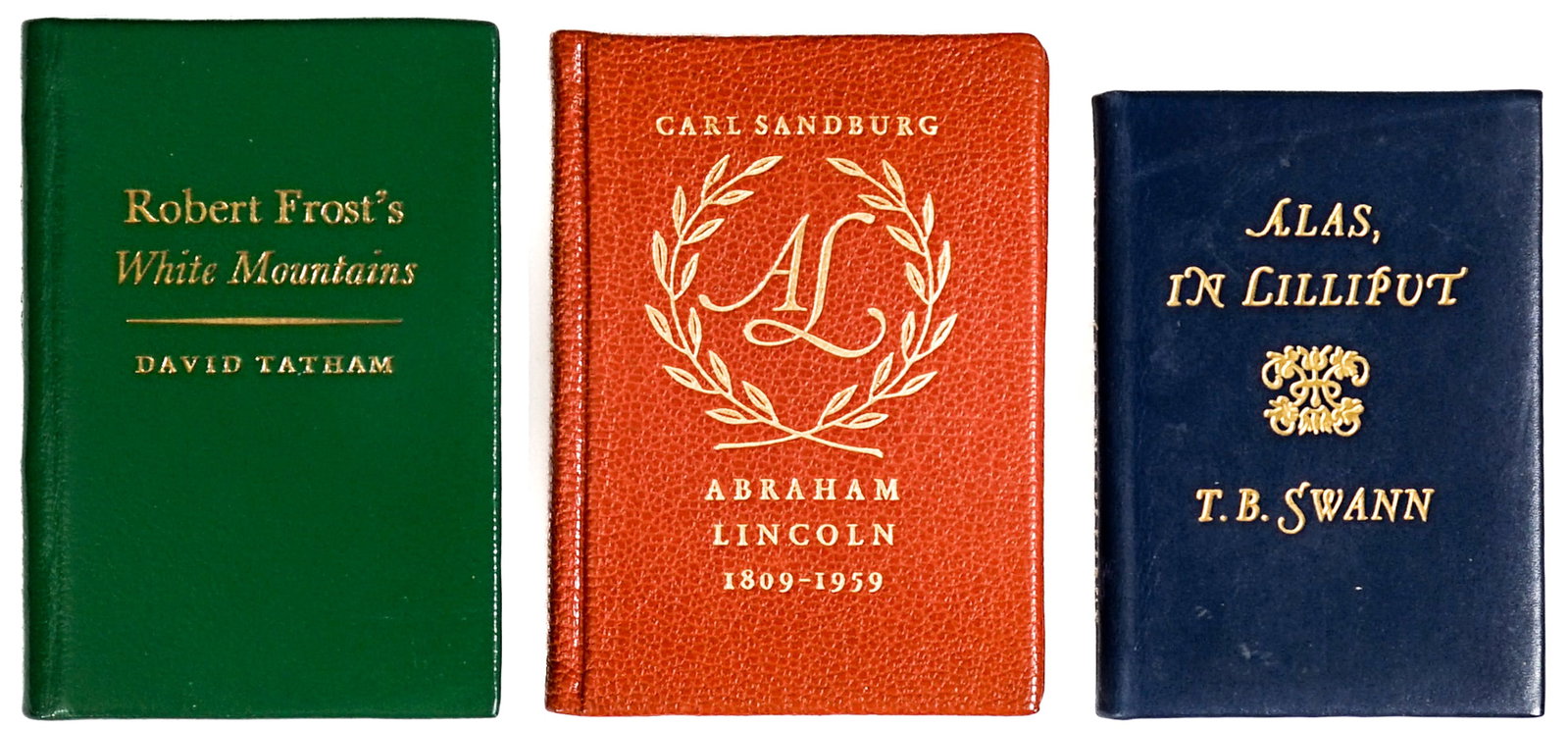 Achille J. St. Onge (3) Miniature Books: Three (3) miniature books include: Alas in Lilliput 1964; Robert Frost's White Mountains 1974; Abraham Lincoln by Carl Sandburg 1959. Lot measures 3.5 in. H x 3.5 in. W x 1.5 in. D for shipping purpos