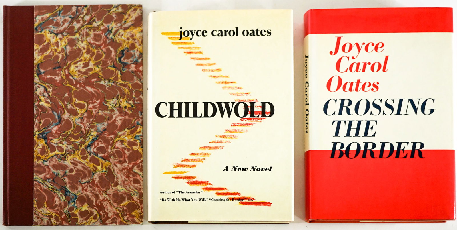 Joyce Carol Oates (3) SIGNED Books: Include: 1) The Step-Father 1978 Lord John Press numbered 187 of 300 copies. 2) Crossing the Boarder. 3) Childwold. Lot measures 9.5 in. H x 6 in. W x 3 in. D for shipping purposes only. The absence o