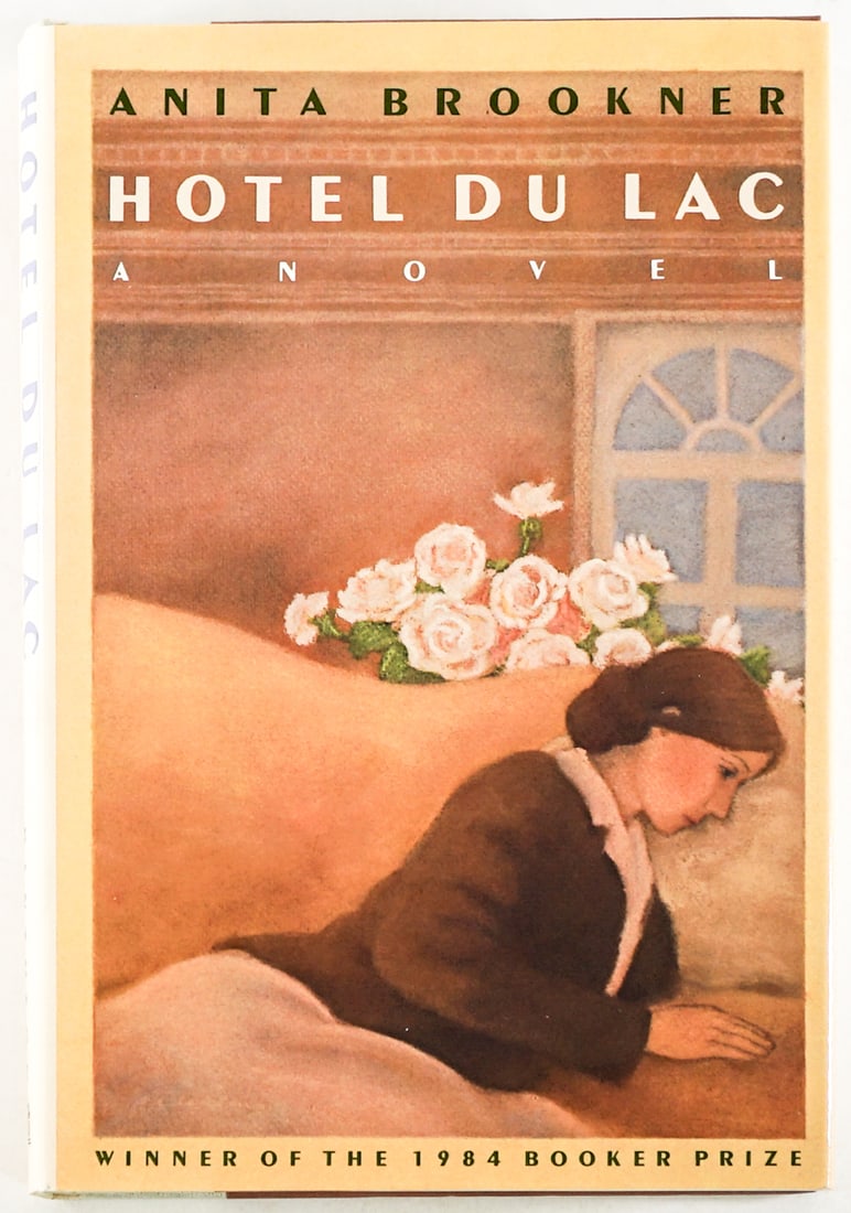 Hotel Du Lac by Anita Brookner SIGNED 1ST US: Hotel Du Lac by Anita Brookner signed with inscription on endsheet. Pantheon 1984 1st American Edition with unclipped dust jacket. 184 pp. Two-tone covers. Lot measures 8.5 in. H x 5.75 in. W x .75 in