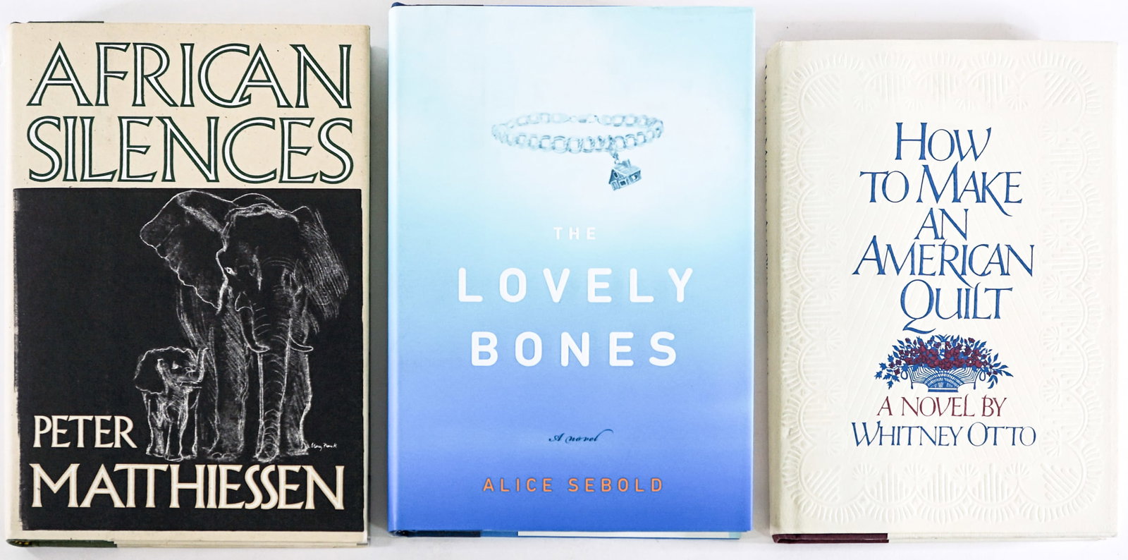 Three (3) Author SIGNED 1st Novels: Three (3) author signed novels all with unclipped dust jackets. Includes: The Lovely Bones by Alice Sebold 2002 1st; How to Make an American Quilt by Whitney Otto 1991 1st; African Silences by Peter M