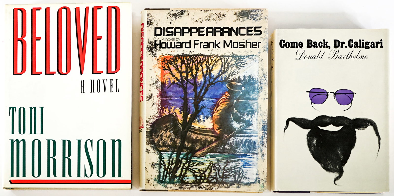 First Edition (3) Books: 1) Beloved by Toni Morrison. Alfred A. Knopf 1987 with unclipped dust jacket. 2) Disappearances by Howard Frank Mosher. Viking 1977 1st 1st with unclipped dust jacket. 3) Come Back. Dr. Caligari by Do
